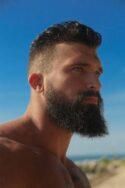 bearded man at the beach
